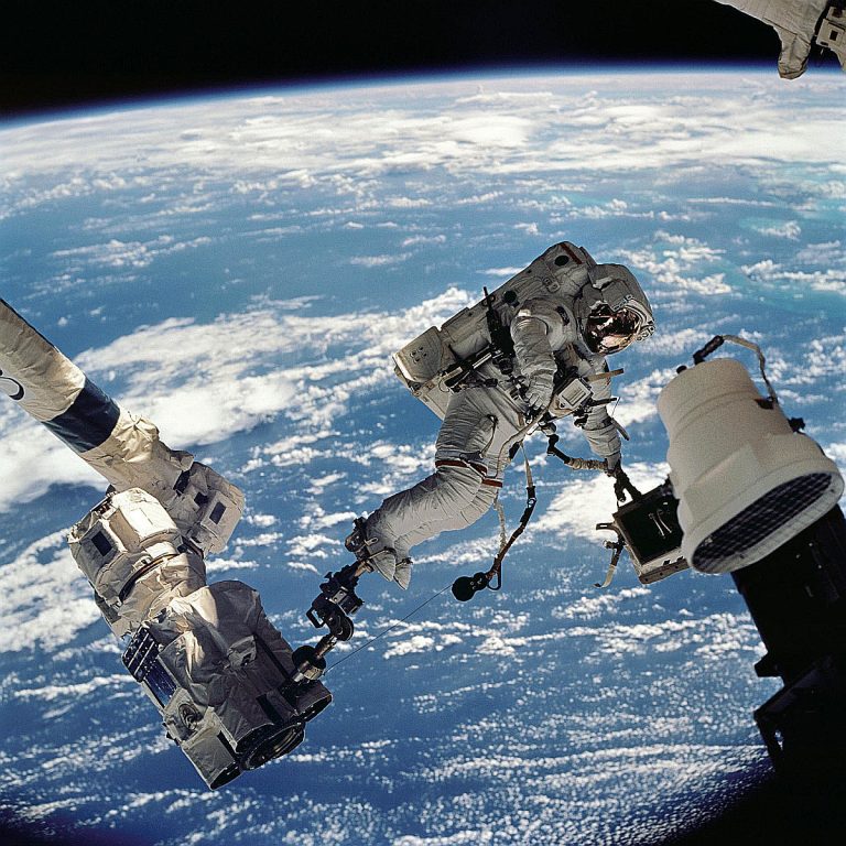 Astronaut on spacewalk outside the International Space Station